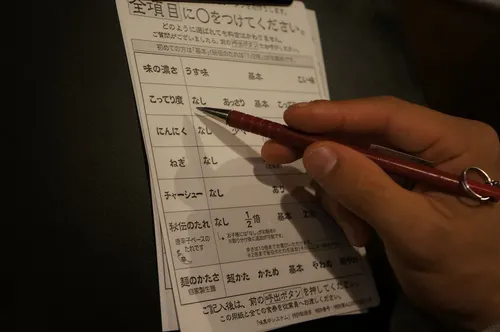 Ordering ramen at Ichiran in Tokyo