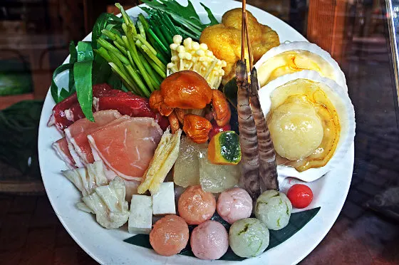A plastic sashimi platter food model in Kappabashi