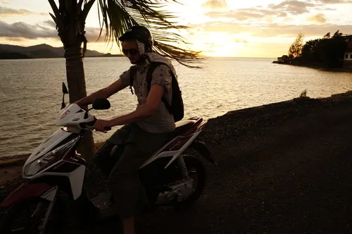 Sunset scooter ride along the coast of Koh Samui