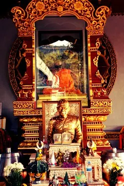 The mummified monk Luang Pho Daeng in his glass case at Wat Khunaram