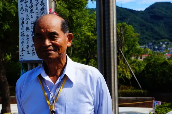 A survivor of the Nagasaki atomic bombing at the Peace Park